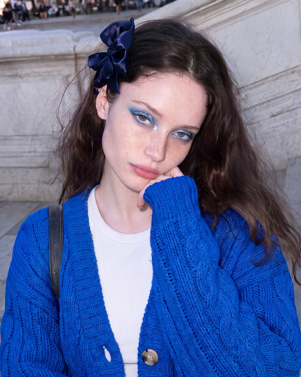 blue cardigan blue eyeshadow