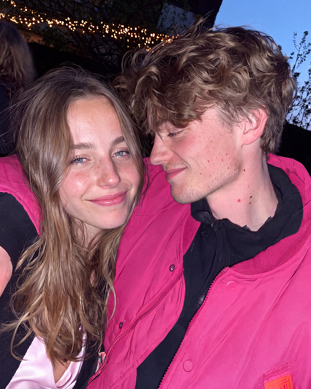 couple pink jackets night