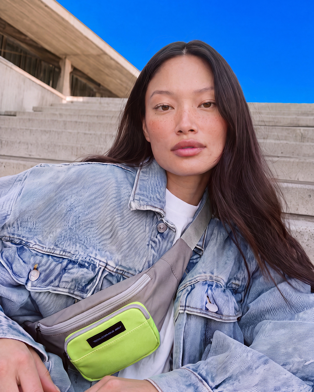 denim jacket neon bag