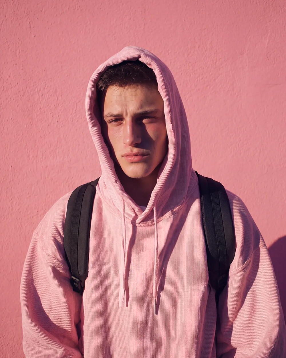pink hoodie pink wall
